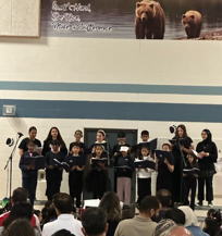Choir singing at Spring Concert in the gymnasium
