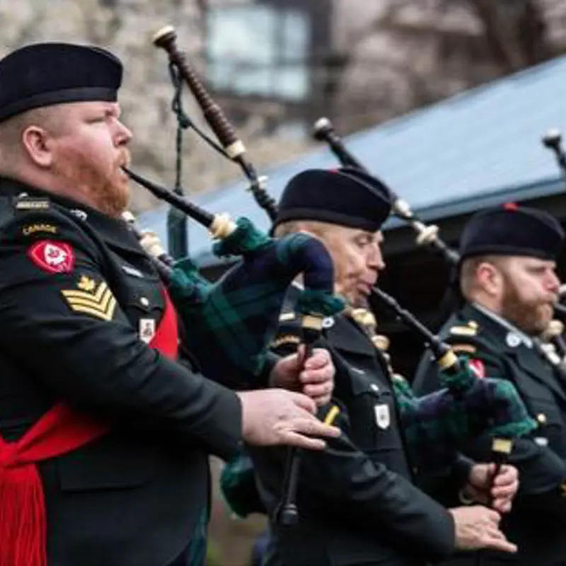 The Argyll and Sutherland Highlanders Pipes and Drums performing during the King's Baton Relay ceremony