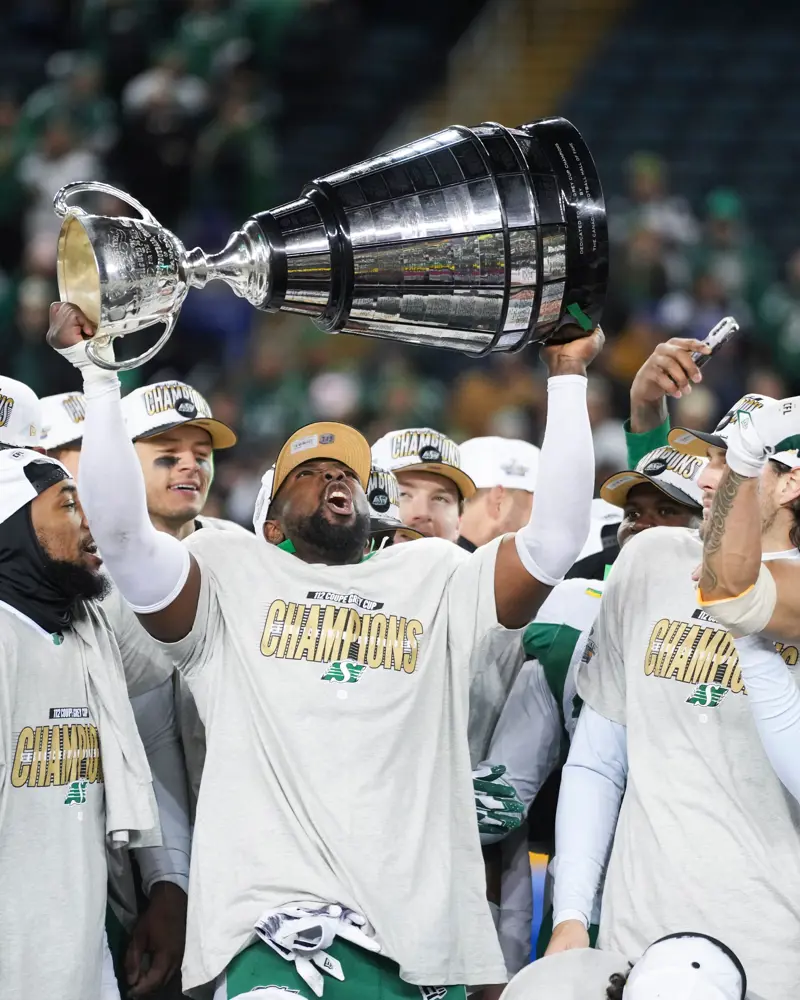 AJ Allen, M.M. Robinson High School graduate and Ottawa Redblacks linebacker, holding the Grey Cup