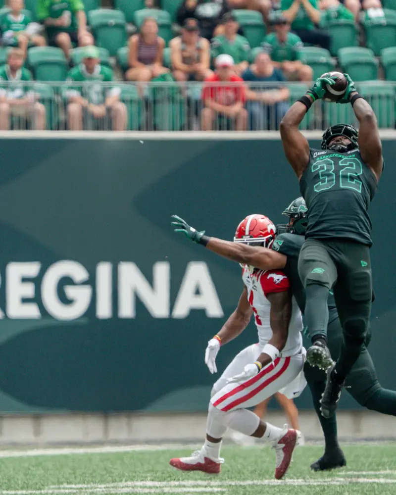 AJ Allen catching a football