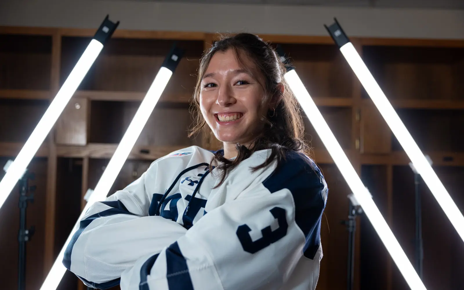 Olivia Muhn, Dr. Frank J. Hayden Secondary School graduate, in hockey uniform
