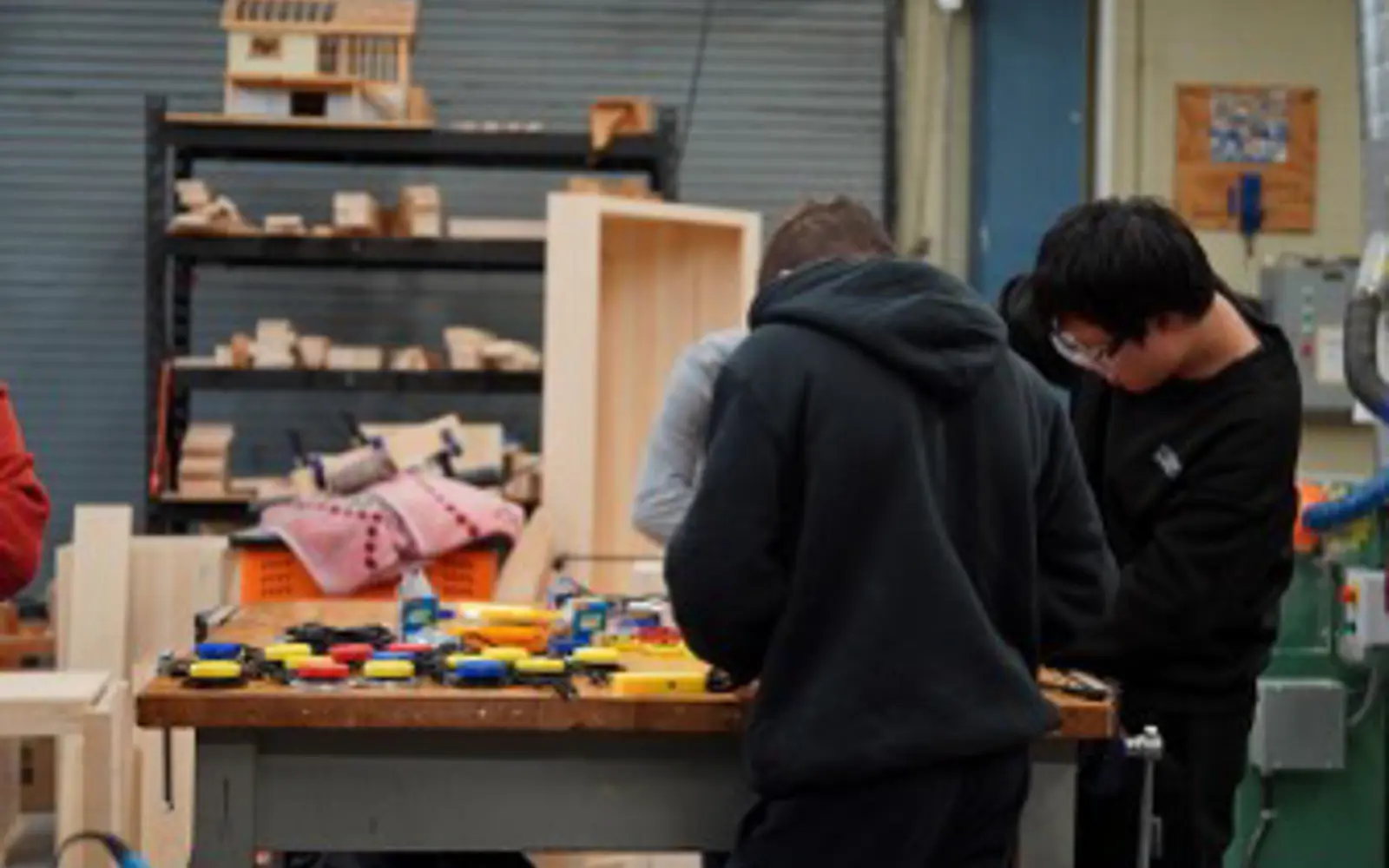 Abbey Park High School students building accessibility devices for children with disabilities as part of the Hacking for the Holidays campaign