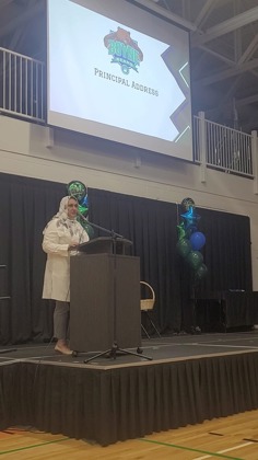 Graduation 2026 Picture of Principal Fatimah Khan at the podium